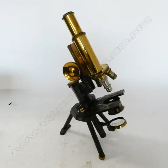 J.SWIFT & SON, LONDON BRASS COMPOUND MONOCULAR MICROSCOPE, RAISED ON FIXED TRIPOD BASE, IN MAHOG BOX